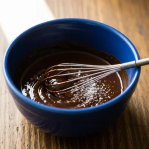 whisk together the cocoa powder, maple syrup, and salt