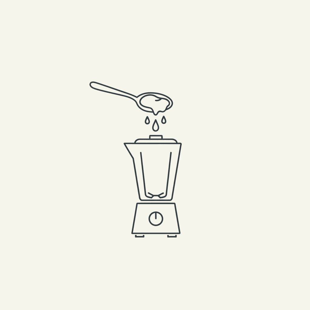 Add the Yogurt: a spoonful of white yogurt dropping into a blender