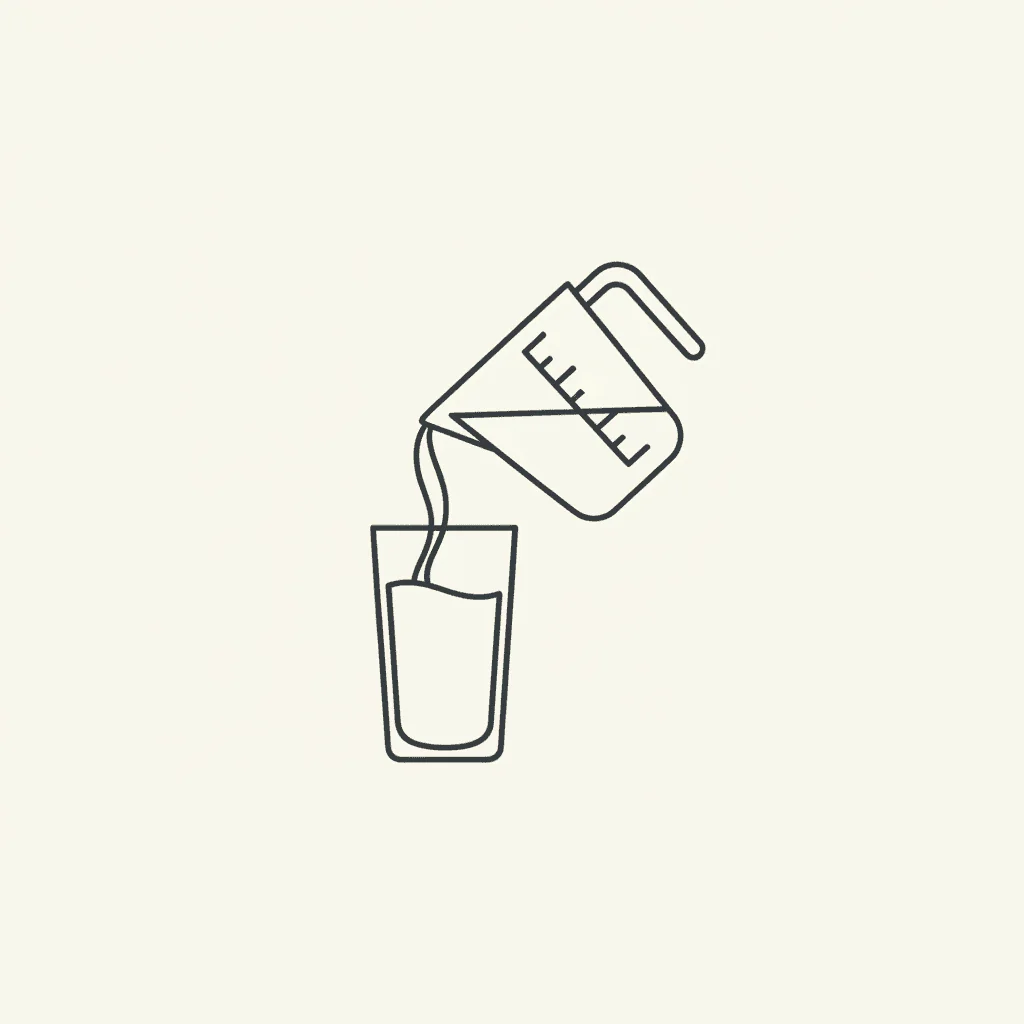 Combine Chai and Milk: a measuring cup pouring liquid into a glass