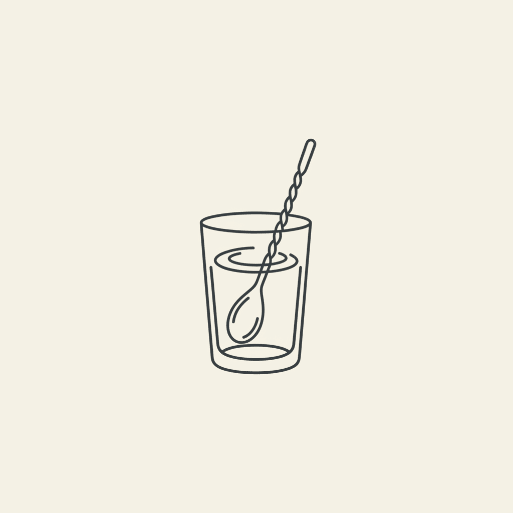 Stir to Chill: a bar spoon stirring a glass