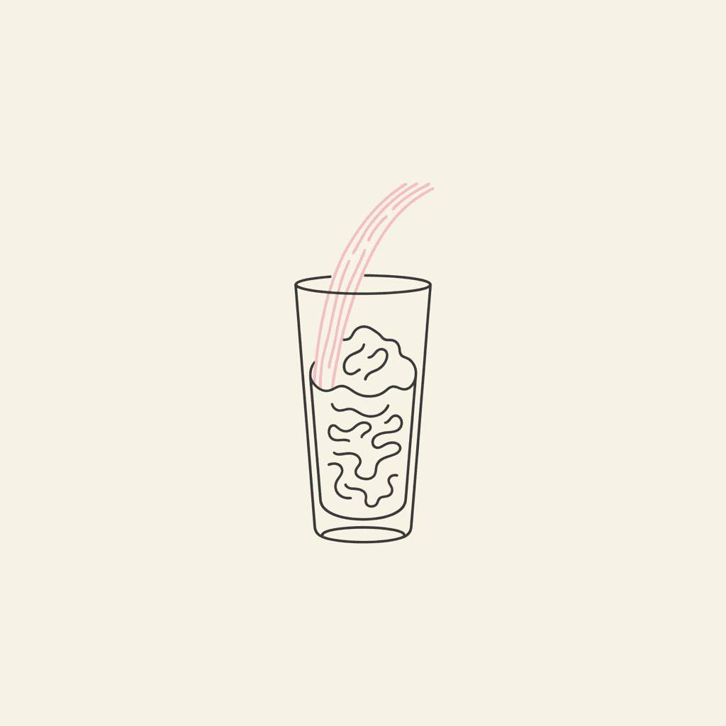 Pour into Glass: a tall glass being filled with a pink slushy stream