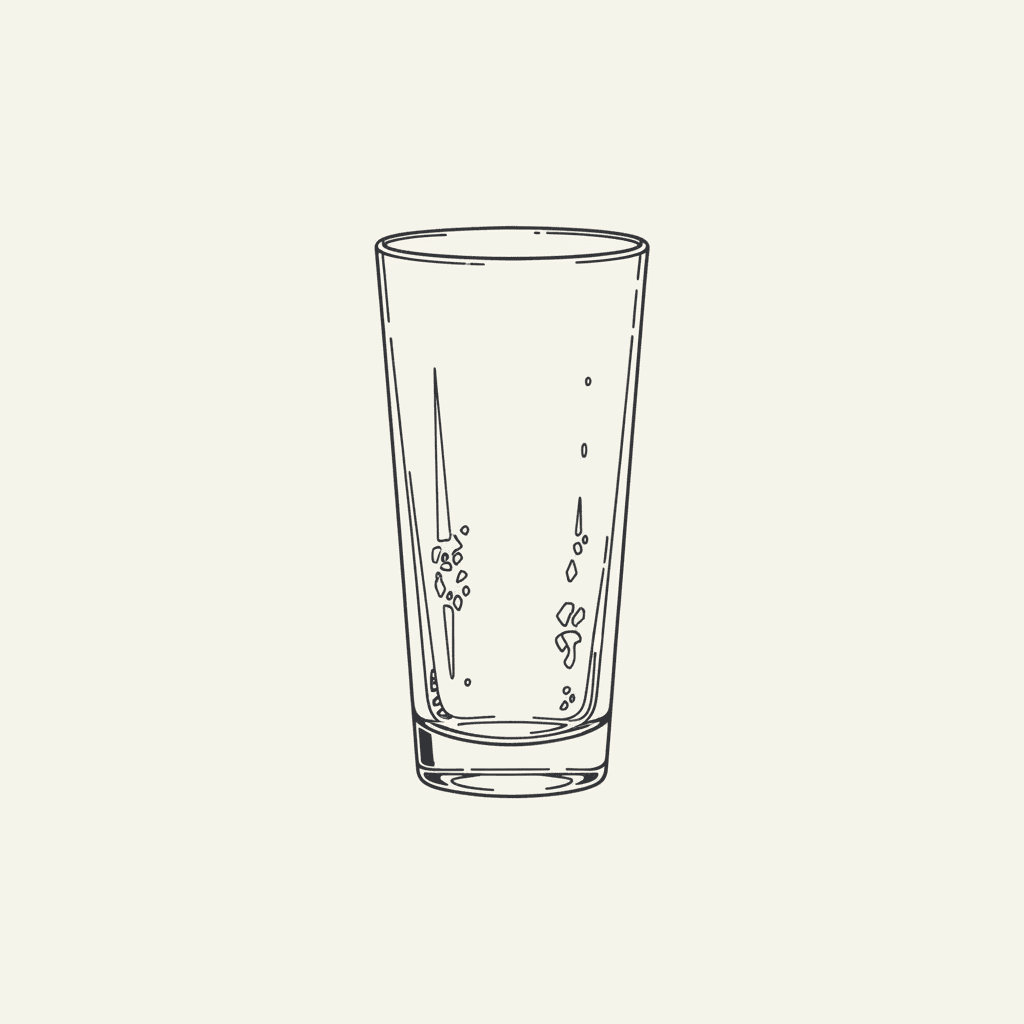 Chill the Glass: an empty tall glass with frost on the outside